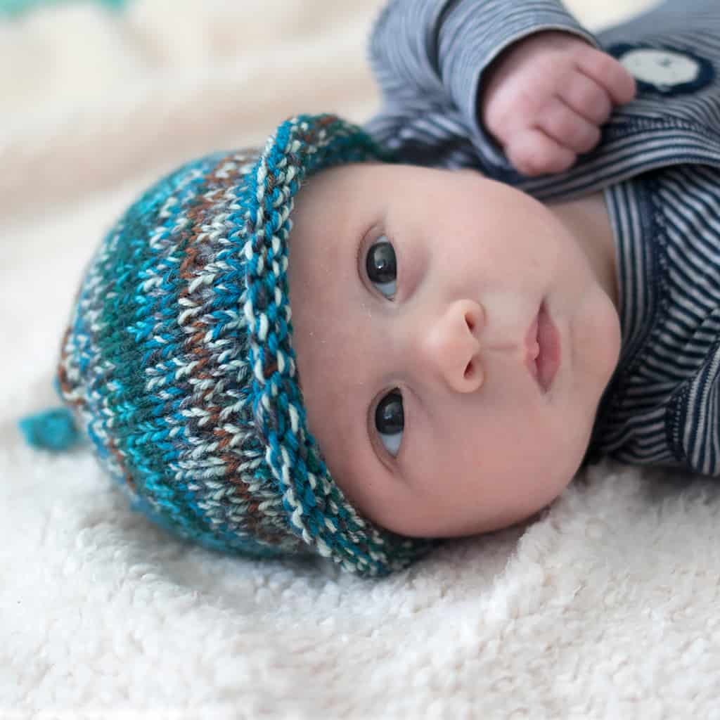Knot Top Baby Hat Knitting Pattern by blogger Gina Michele