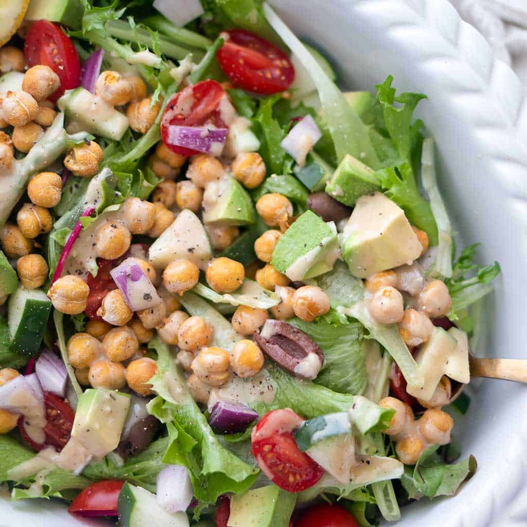 Fresh & Flavorful Vegan Greek Salad with Creamy Tahini Dressing